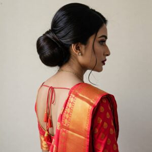 Sleek Low Bun Hairstyle For Saree indian genrate image